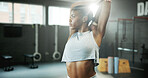 Fitness, girl and thinking with stretching in gym for muscle relief, start exercise and space. Flare, black person and arm warm up at health club for training preparation, getting ready or reflection