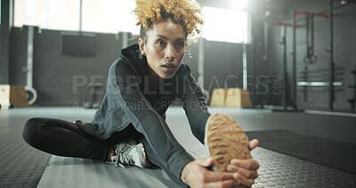 Buy stock photo Stretching, leg and woman in gym, fitness and getting ready for workout routine, wellness and health. Flexible, athlete and person on floor for exercise preparation, physical activity and warm up