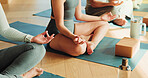Fitness, yoga and women in lotus pose in studio for relax, peace and calm with wellness. Chakra, meditation and group of female people with breathing for balance, mindfulness or zen in health club.
