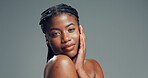 Beauty, black woman and skincare portrait in studio for acne treatment results, glow and hydration. Mockup space, person and smile on gray background for healthy skin, self care radiance and wellness