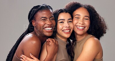 Buy stock photo Happy women, portrait or hug with beauty, diversity, skin tone for cosmetics on studio background. Female people, interracial or multiracial with smile for skincare, health or wellness in salon