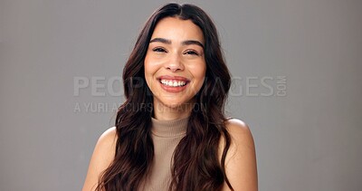 Buy stock photo Woman, laughing and cosmetics for haircare, portrait or maintenance of texture, self care and studio. White background, mockup space and person with healthy hair, wellness and hairstyle in Brazil