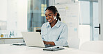 Laptop, report and typing with business black woman at desk in office for financial accounting. Computer, finance and smile with happy African employee in workplace for budget or risk management
