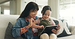 Bonding, learning or tablet with mother and daughter on sofa in living room of home for development. App, education or reading with girl child and single parent woman in apartment for online safety