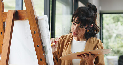 Buy stock photo Woman, painting canvas and easel with color palette for art, drawing or creative sketching in home. Female person, artistic or painter with brush or frame for artwork, creativity or talent in house