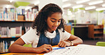 Homework, kid and girl in library, studying and education with knowledge, paper and growth. Student, learning and child development with creativity, smile and prepare for exams, assessment and notes