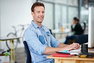 Buy stock photo Portrait, smile and business man typing on computer in office at startup, company or workplace for career. Happy face, creative writer and entrepreneur on desktop for work email or project in Italy