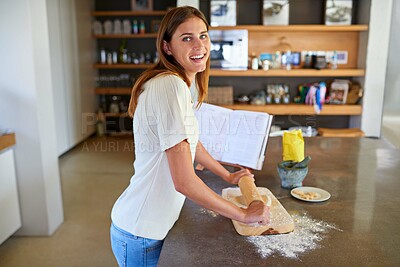 Buy stock photo Baking, home and portrait of woman with smile, rolling pin and flour for lunch in recipe book. Diet, wellness and happy female person in kitchen with ingredients, nutrition and healthy homemade bread
