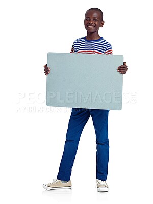 Buy stock photo Black child, portrait and blank board in studio, poster and information on white background. Male person, empty display and mockup space on sign for news or announcement, promotion and commercial