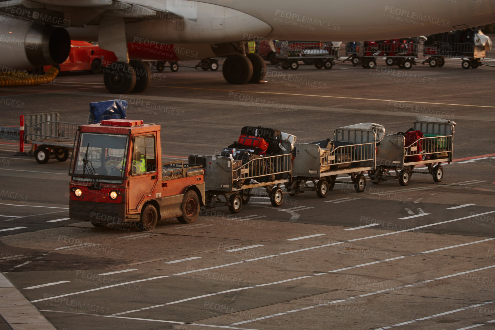 Buy stock photo Airport, plane and truck for luggage, cargo or logistics for flight with transportation on runway. Airplane, trailer and tractor for baggage, trolley or tarmac for international travel with vehicle