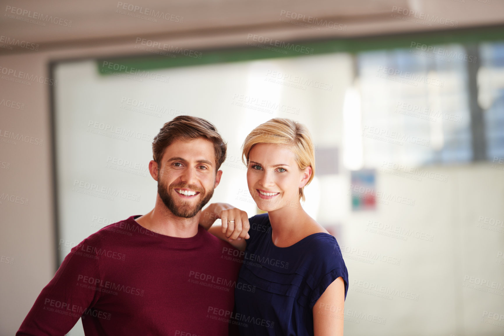 Buy stock photo Portrait, couple and pride in startup, hug or partnership for funding opportunity, space and support. Small business, entrepreneurs and people with smile for loan approval, confident and embrace