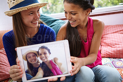 Buy stock photo Happy children, tablet screen and profile picture with friends in home, social media post and selfie. Tech, girls and photo in house with teenager to show memory, capture moment or bonding together