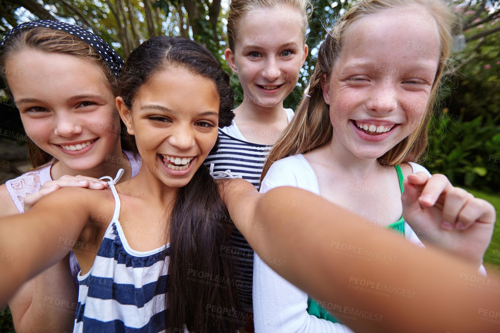 Buy stock photo Happy girl, portrait and kids with selfie in nature for bonding, outdoor fun or weekend together. Teenagers, smile or group of friends with picture for photography, capture moment or social media