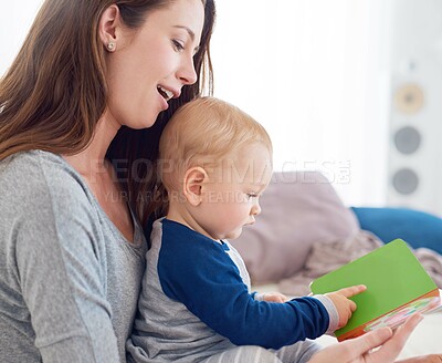 Buy stock photo Mom, baby and book for reading or storytelling for support, love and cute as toddler for growth and child development. Parent, kid and happiness at home with playing for bonding, childhood memories
