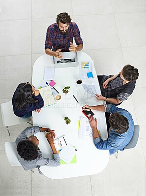 Buy stock photo Employees, people and office with laptop for teamwork, collaboration and employee training with mentor. Above, support and learning as graphic designer for career growth, progress and internship