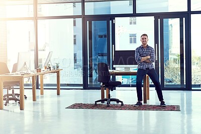 Buy stock photo Man, manager and office for success on desk, creative and workplace leader. Entrepreneur, boss and web design agency with male ceo, business and technology for startup company and sitting on table