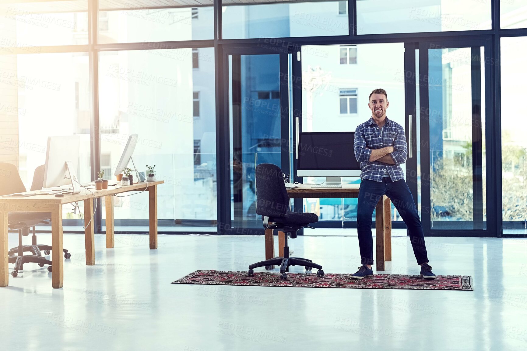 Buy stock photo Man, manager and office for success on desk, creative and workplace leader. Entrepreneur, boss and web design agency with male ceo, business and technology for startup company and sitting on table