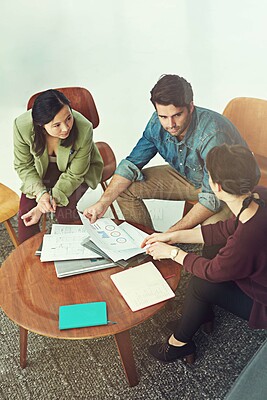 Buy stock photo Team, meeting and paperwork with data, research and analysis of company, startup and financial results. People, desk and documents with charts, graphs and feedback on kpi, report and administration