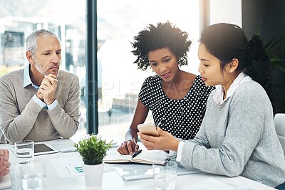 Buy stock photo Business people, meeting and smartphone in office for planning, discussion and teamwork with technology. Coworkers, notes and mobile in boardroom for project, ideas and brainstorming at workplace