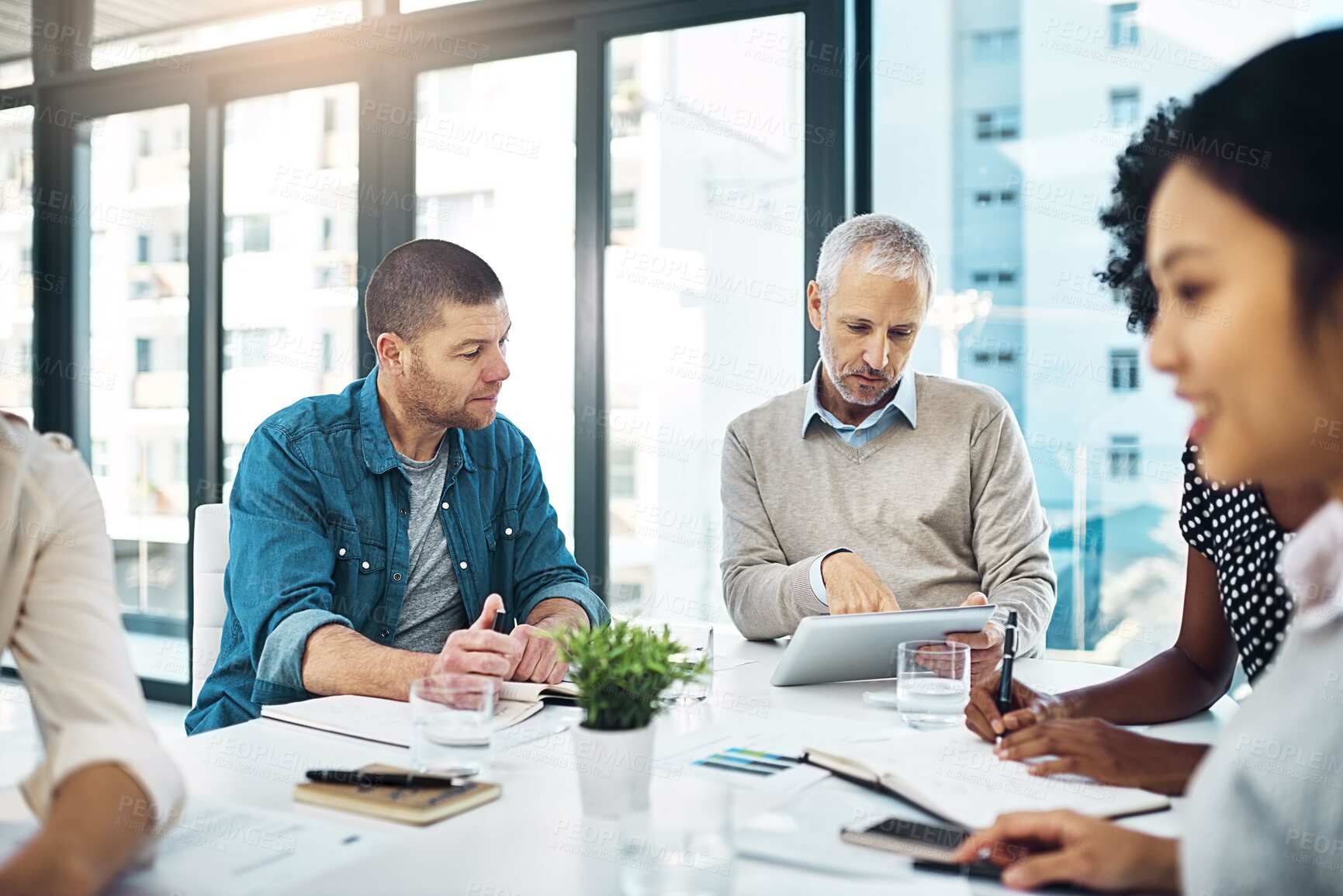 Buy stock photo Business people, meeting and tablet in office for planning, discussion and teamwork with technology. Coworkers, notes and smartphone  in boardroom for project, ideas and brainstorming at workplace