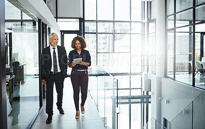 Buy stock photo Business people, mentor and helping employee with tablet for advice, teamwork and collaboration in office. Senior manager, support and intern training with planning, learning and questions for growth