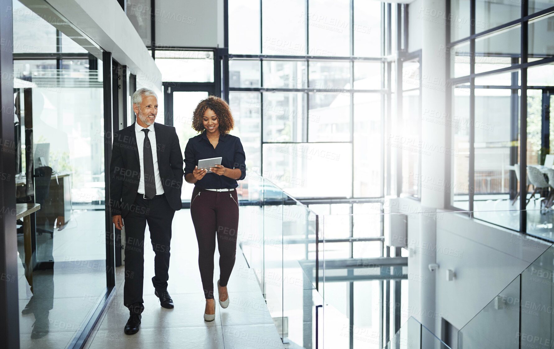 Buy stock photo Business people, mentor and helping employee with tablet for advice, teamwork and collaboration in office. Senior manager, support and intern training with planning, learning and questions for growth
