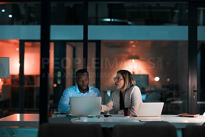 Buy stock photo Employee, teamwork and laptop in office at night with documents for deadline or overtime as accountant. Business, people and partner for financial reviews, records and auditing for company report