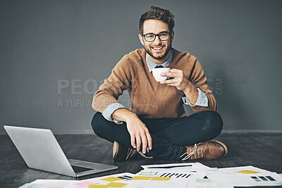 Buy stock photo Businessman, floor and laptop with coffee, documents and smile for planning, research and information. Financial analyst, portrait and tech with tea, paperwork and data for investment opportunity