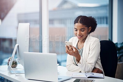 Buy stock photo Business woman, office and smile from phone text with a content creator with social media break. Desk, creative agency and African professional with internet, app and happy from online message