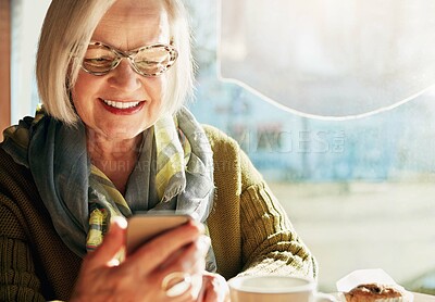 Buy stock photo Senior woman, smile and browsing smartphone in cafe with laugh for internet or social media with relax. Funny, post and tech savvy in restaurant with coffee, muffin and sunshine in retirement