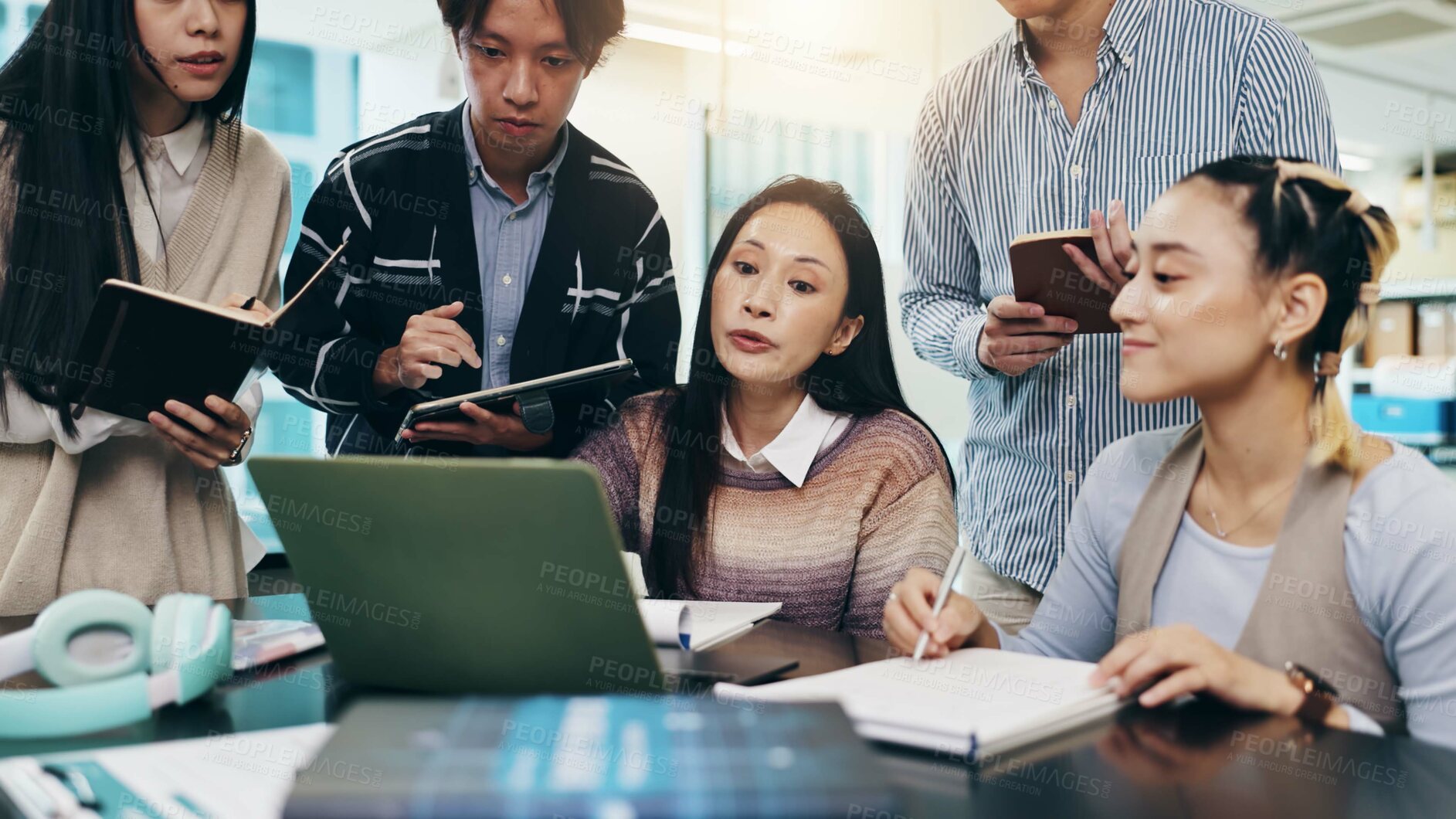 Buy stock photo Japanese people, meeting and laptop for video conference, collaboration and writing notes in office. Group, teamwork and technology for brainstorming, discussion and project management as colleagues