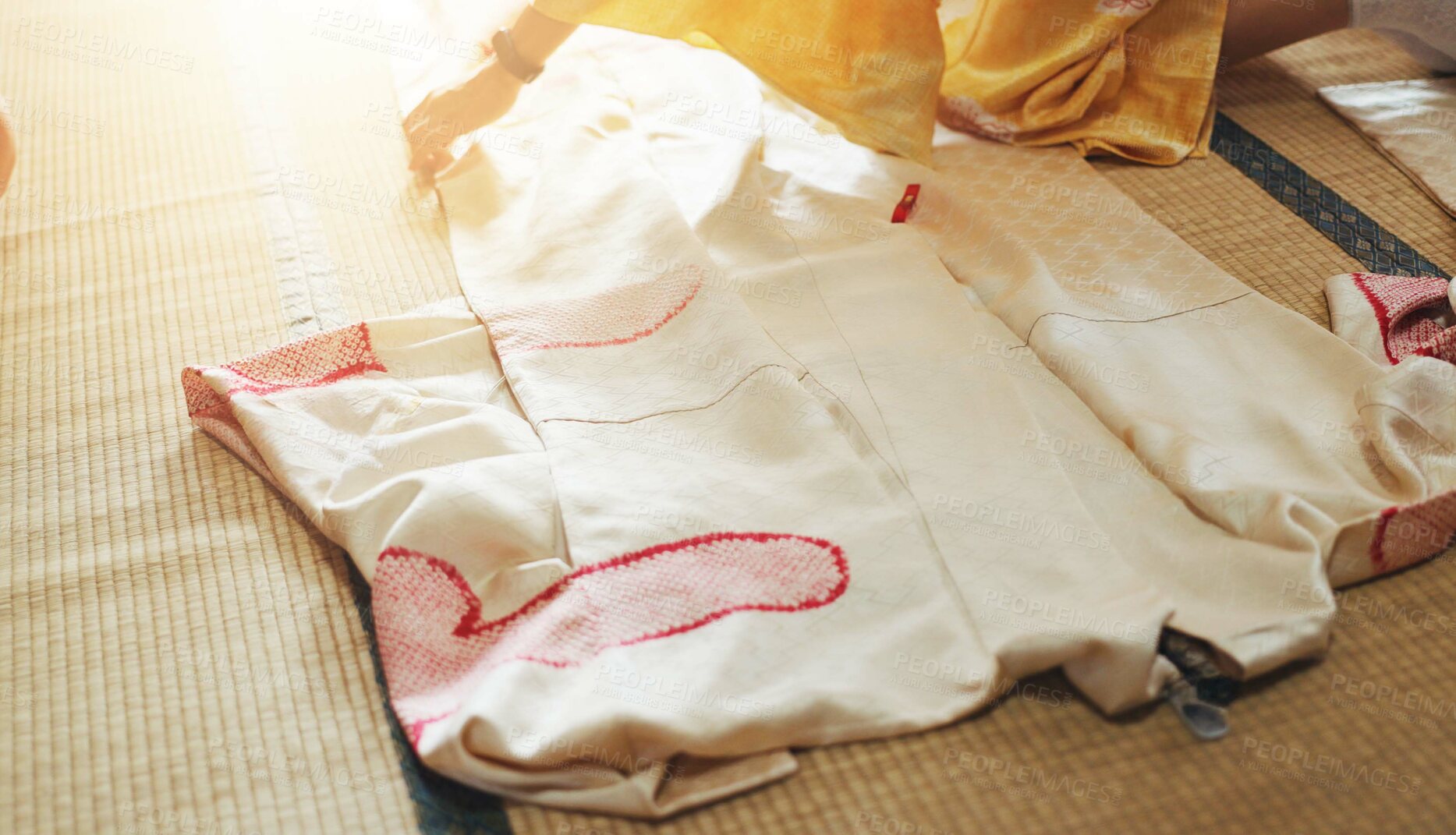 Buy stock photo Fashion designer, tailoring and hands with measuring fabric for kimono garment and manufacturing process in workshop. Seamstress, person and dress pattern of textile design at japanese small business