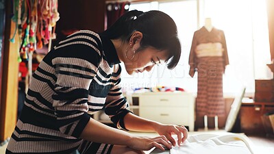 Buy stock photo Fashion designer, seamstress and Asian woman with clothes in workshop for stitching, manufacturing or process. Small business, boutique and people with material, fabric or textile for tailor in Japan