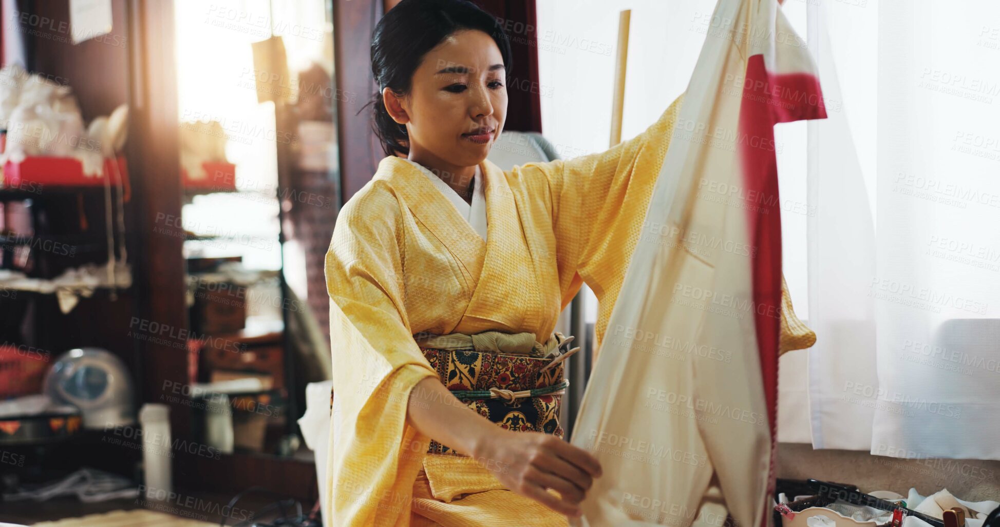 Buy stock photo Fashion designer, clothing and Asian woman with fabric for kimono, traditional and indigenous style. Creative business, boutique and person with textile and material for tailor service in Japan