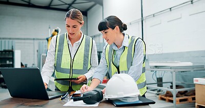 Buy stock photo Women, engineer team and technology in meeting for planning, discussion or communication at factory. Female employees, collaboration and brainstorming for robotics with laptop, writing and safety ppe