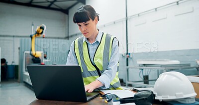 Buy stock photo Engineer, laptop and woman with robotics for production at assembly line in factory. Computer, automation or worker research for manufacturing process, industry 4.0 or typing software for programming