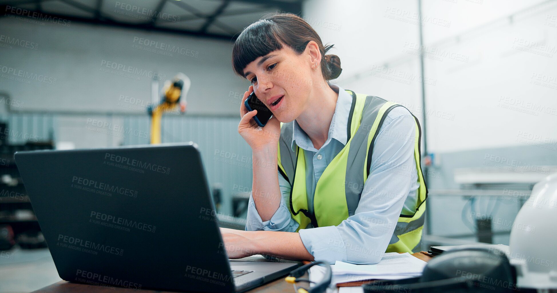 Buy stock photo Engineer, laptop and phone call in robotics warehouse for manufacturing schedule, planning and project management. Woman, operator and tech in industrial factory for automation update with contact