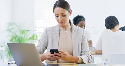 Buy stock photo Update, office or businesswoman texting with phone for online feedback or message. Coworking, laptop or consultant checking mobile app for email notification, technology or news search in workplace