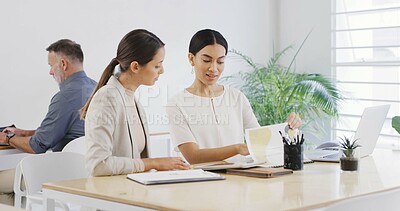 Buy stock photo Document, business women and discussion in meeting to review brand proposal with graphic designer. Paperwork, planning and collaboration with creative team in office for logo or project briefing