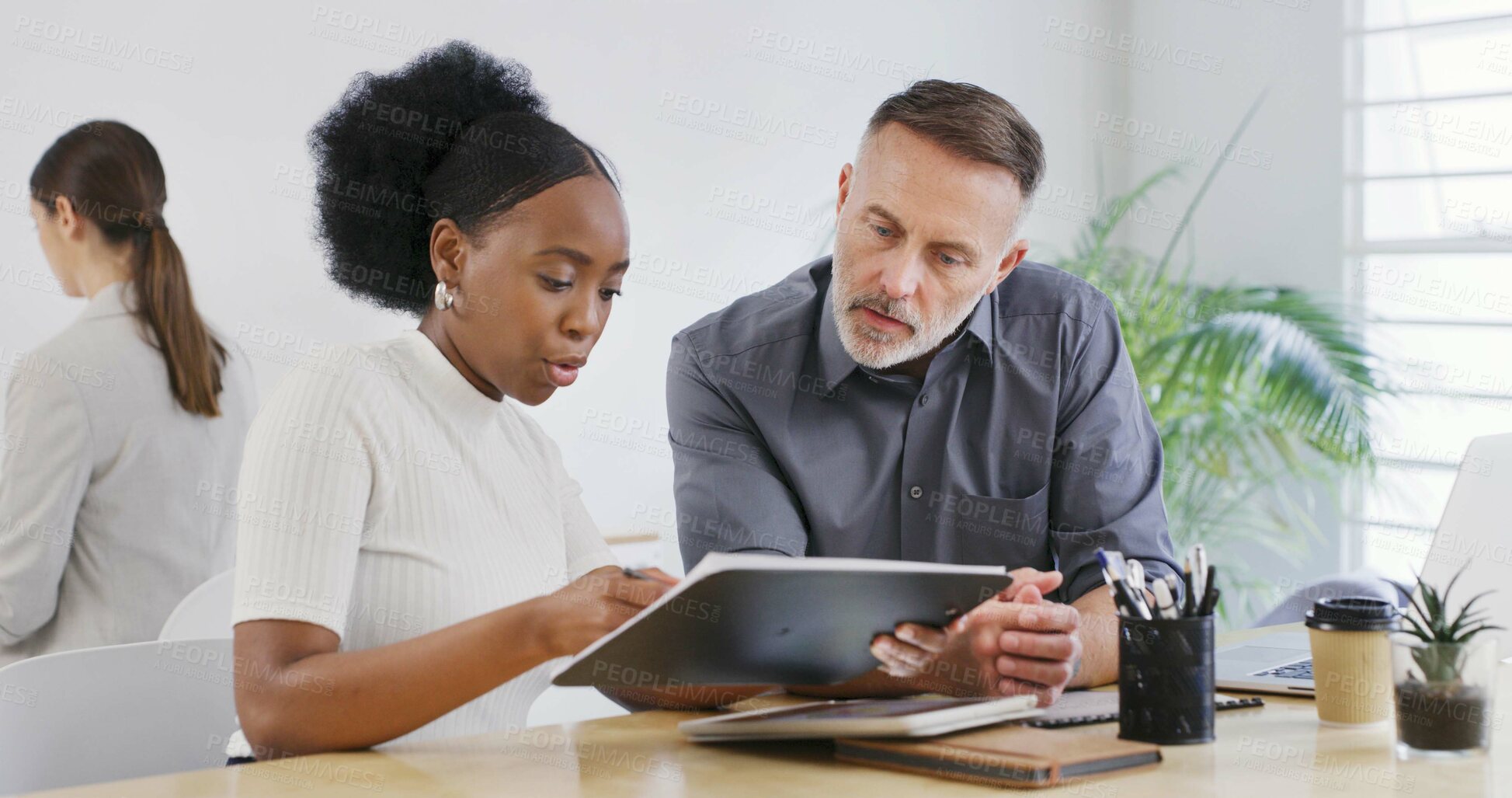 Buy stock photo Woman, man and discussion with clipboard at office for climate consulting for sustainable business. People, checklist and team with feedback at eco friendly startup, insight or collaboration at job