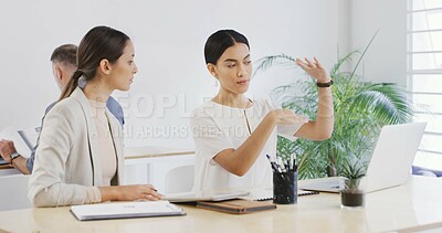 Buy stock photo Laptop, business women and discussion in meeting to review brand proposal with graphic designer. Computer, planning and creative team in office for logo, explain steps or project briefing online