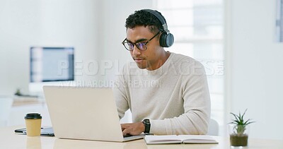 Buy stock photo Reading, laptop and headphones with business man in office for learning, webinar and demo walkthrough. Policy training, online orientation or streaming with person in agency for professional upskill
