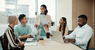 Buy stock photo Business people, meeting and document with laptop for task, delegation or brainstorming at office. Group of employees, strategy discussion and technology with paperwork for project management or idea