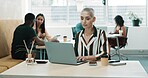 Business, woman and reading on laptop in office for research, finance report and review budget. Female person, pc and coworking for financial planning, bookkeeping information and company investment