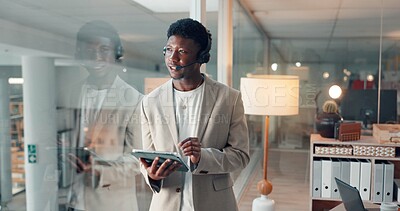 Buy stock photo Thinking, headset and tablet with business black man in office for reflection, virtual consultant and review. Online advisor, planning and communication with person in agency for perspective and crm