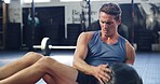 Strong, medicine ball and fitness with man in gym for ab exercise, health and challenge. Strength training, bodybuilder and workout with person in sports club and equipment for athlete and core