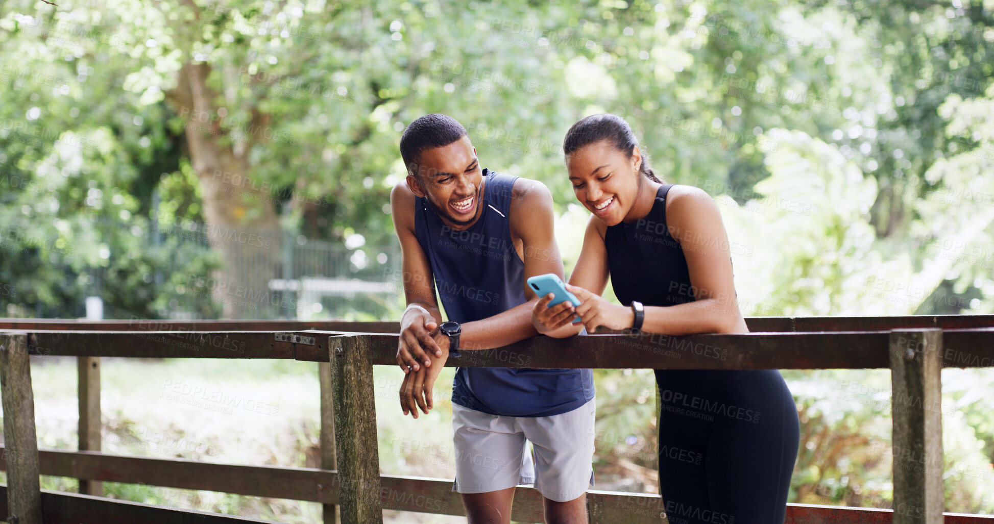 Buy stock photo Hiking, nature or happy people with phone on bridge, outdoor exercise or digital map for trail navigation. Fitness, track steps and friends with mobile location app, fauna and flora research on break