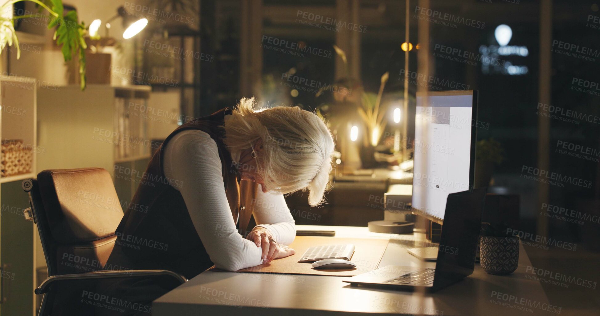 Buy stock photo Frustrated, business woman and night with burnout for overworked pressure, deadline or stress. Tired, female person or employee on technology in late evening for fatigue or mental health in workplace