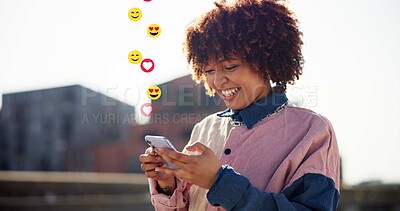Buy stock photo Happy woman, phone and reaction with emoji in city, laugh and texting with funny chat, meme or icon. African person, smartphone and smile with sign, symbol or mobile app on social media in urban town