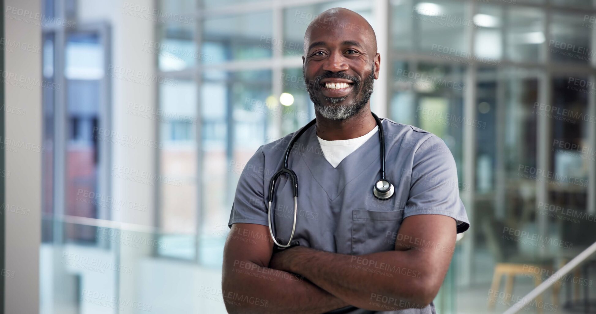 Buy stock photo Portrait, black man and doctor with arms crossed in hospital for career pride, about us and healthcare services. Happy, mature person and ambition for medical support, cardiology surgeon and wellness